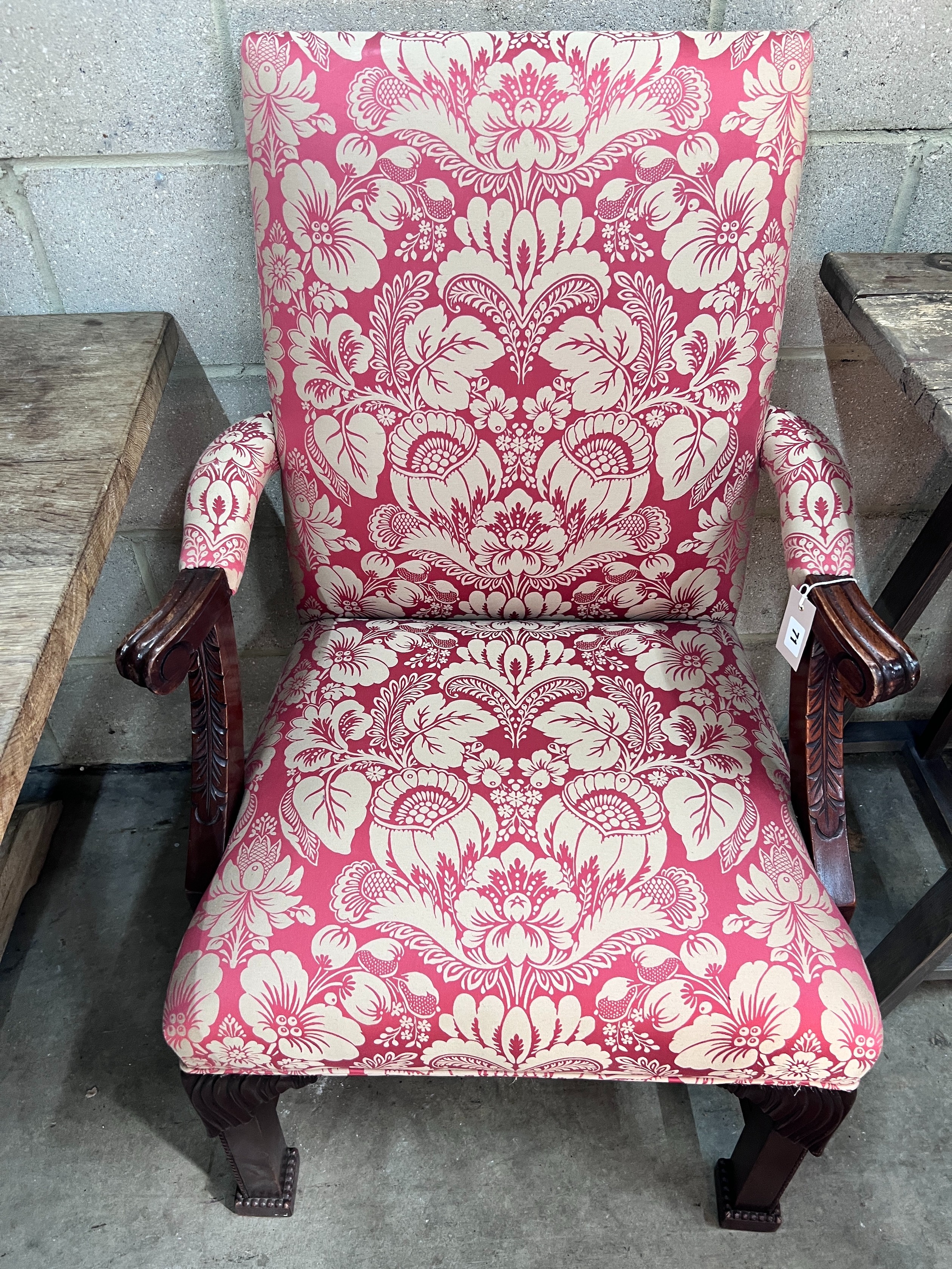 A reproduction mahogany upholstered Gainsborough style library chair, width 65cm, depth 70cm, height 102cm *Please note the sale commences at 9am.